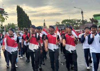 1 SST Brimobda Turut Meriahkan Kirab Bendera Merah Putih dalam Rangka Memperingati HUT RI ke-80