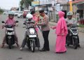 Kapolres Mukomuko dan jajaran Polres Mukomuko,Bagikan 1.000 Bendera Merah Putih, Semarakkan HUT ke-81 Kemerdekaan RI