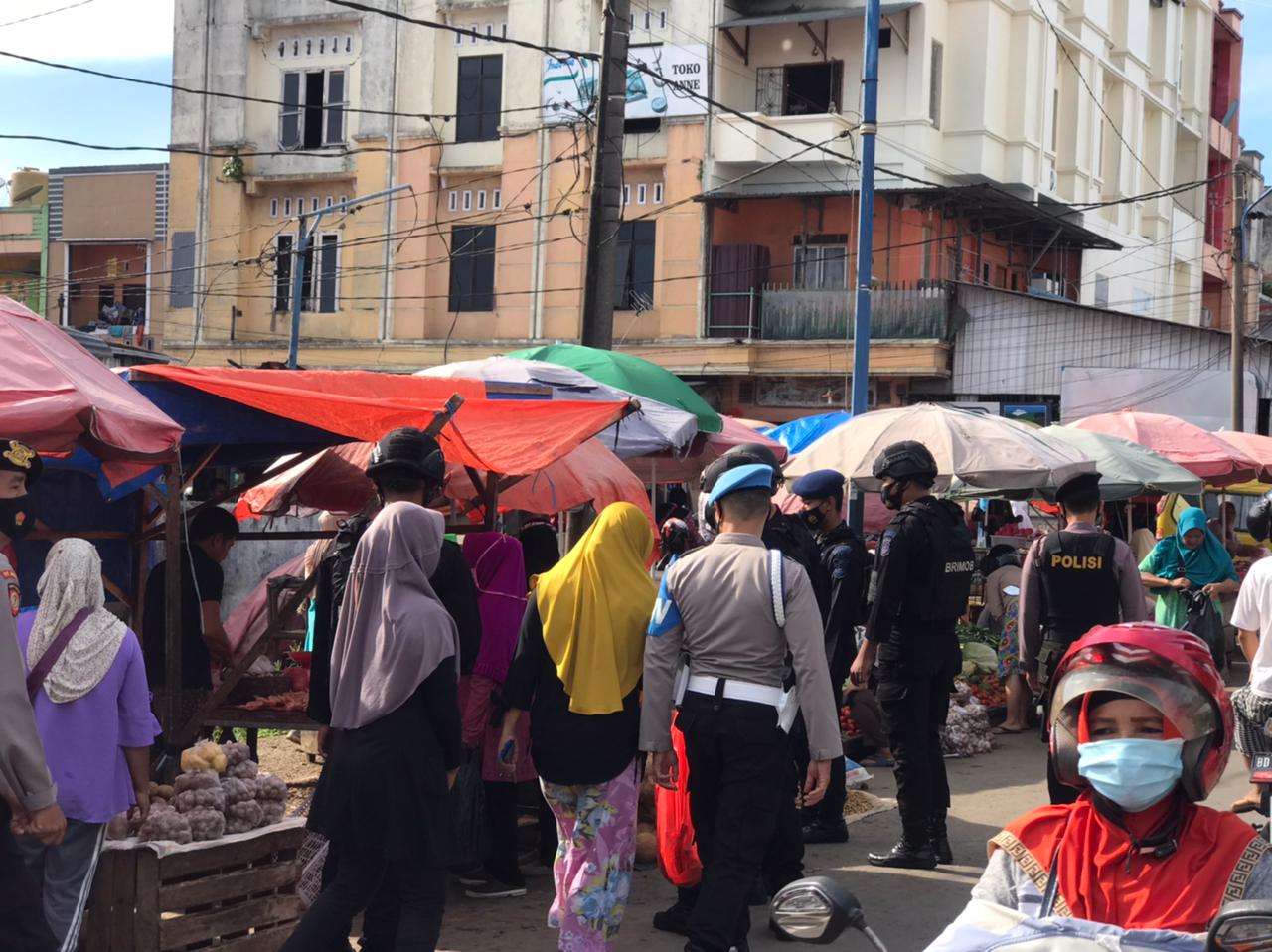 Patroli Kawasan Pasar, Satgas Aman Nusa Polda Bengkulu Ingatkan Masyarakat Patuhi Prokes