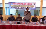 Kapolsek Padang zJaya Hadiri Musyawarah Pembangunan Desa