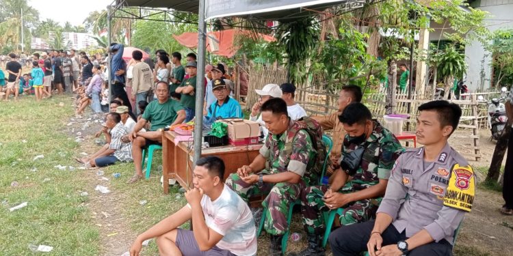 Bhabinkamtibmas Polsek Seginim Laksanakan Pengamanan Turnamen Sepakbola Seginim CUP Tahun 2024