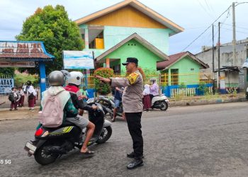 Laksanakan Pengaturan Lalin, Polsek Ratu Samban Antisipasi Laka Lantas serta Gangguan Kamtibmas