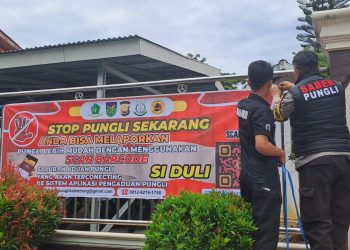 Mudahkan Masyarakat Lapor Pungli, Polisi Pasang Spanduk dan Banner Sosialisasi Barcode